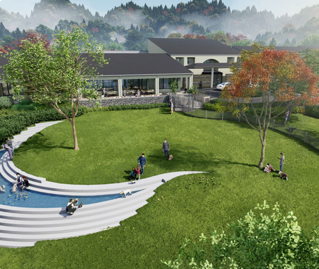 緑豊かな庭園と曲線的なデザインの屋外スペース